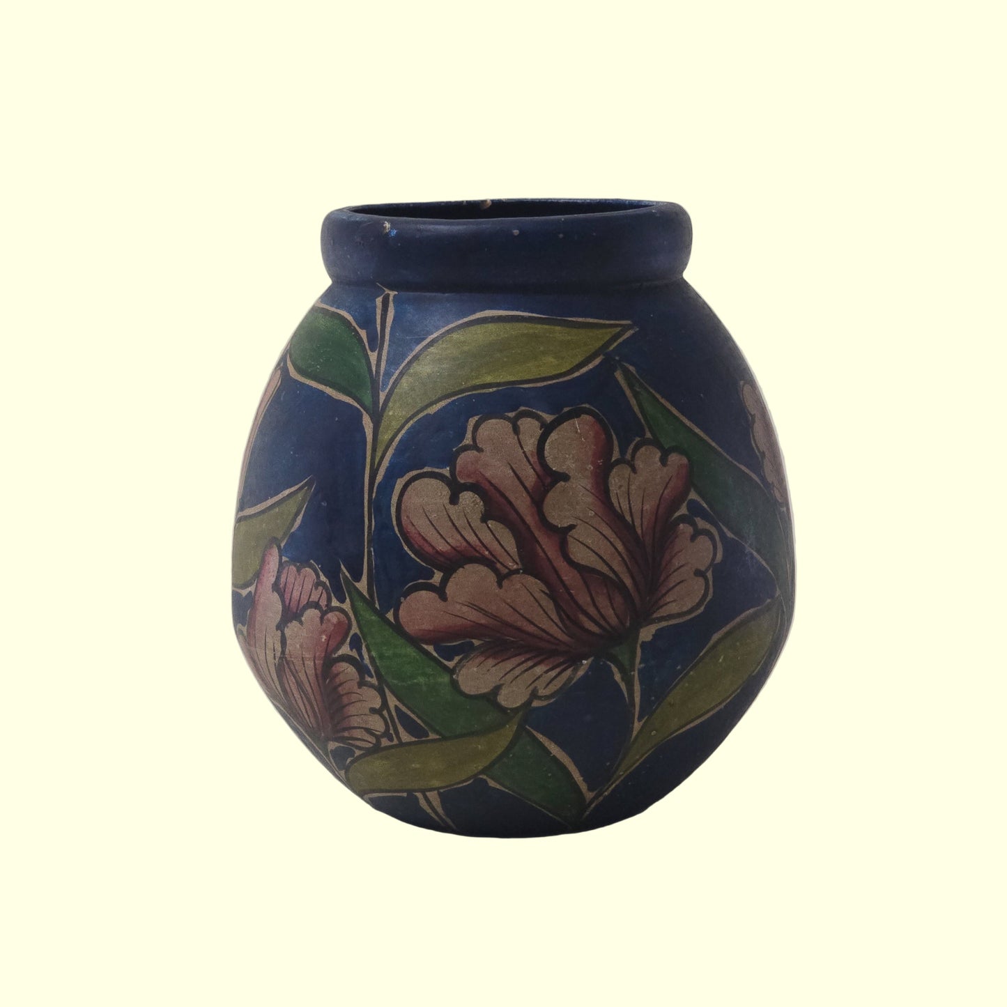 Ceramic vase with floral design on a gray background