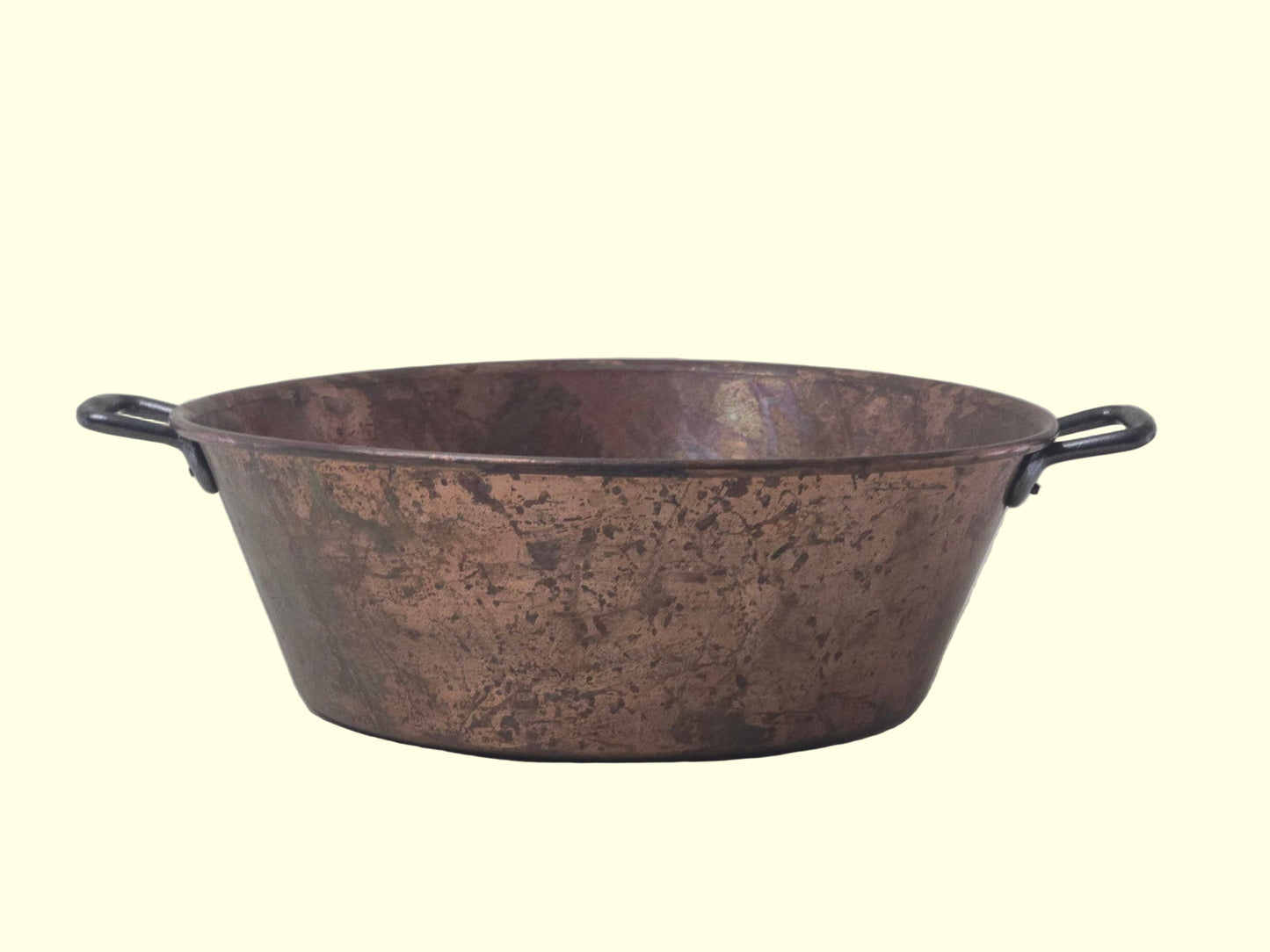 Bronze basin with handles on a gray background